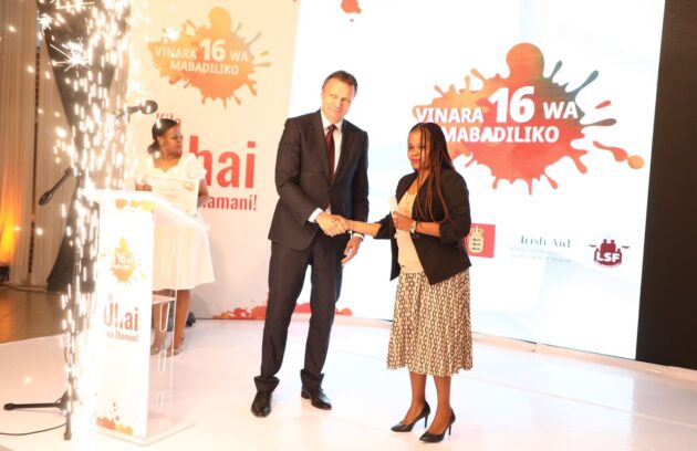 Zaituni Receiving award from Ambassador of Switzerland in Tanzania